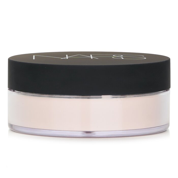 A pastel-shaded loose powder that sets makeup while enhancing skin radiance with soft luminosity Formulated with synthetic fluorphlogopite & mica to control viscosity & reflect light for a soft-focus finish Incorporates glycerin & caprylyl glycol to hydrate skin & maintain moisture balance throughout wear Uses silica & dimethicone to smooth texture & blur fine lines, pores & imperfections for a flawless look Combines sea water extract & calcium chloride to soothe skin & support mineral balance for a healthy glow Avoids parabens, talc & fragrance to minimize irritation & ensure compatibility with sensitive skin types Suitable for all skin types including sensitive & acne-prone due to its non-comedogenic formulation Made in the USA